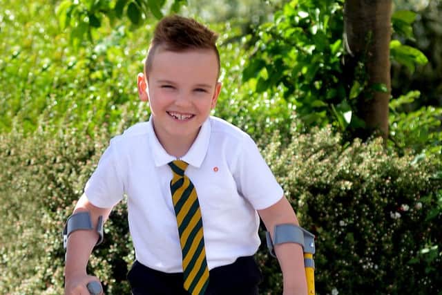 Newspaper: Pontefract & Castleford Express.
Story: Cameron Harper from Whitwood, Castleford. Cameron who has Cerebral Palsy, had an operation earlier during 2015 which is designed to help him walk for the first time.
Photo Date: 18/05/15
Photo Ref: AB036c0515