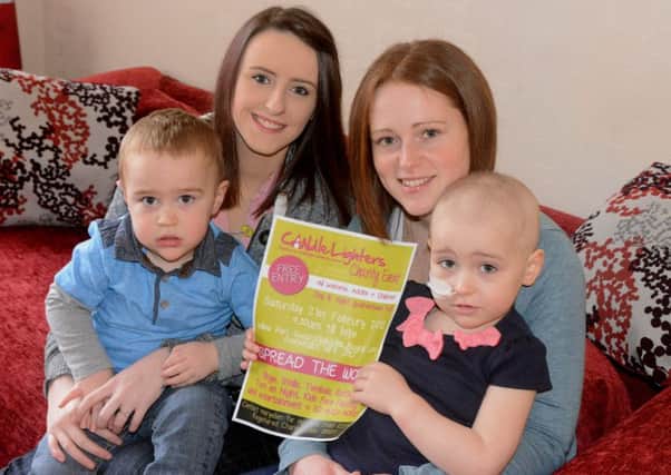 Olivia Watson with her mum Gemma, brother Zack and Maryellen Jaques who are raising money for Candlelighters. (p621a504)