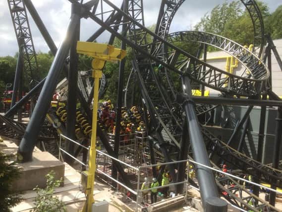 The scene at Alton Towers as four teenagers suffered serious leg injuries in a collision between two carriages on the amusement park's Smiler rollercoaster.