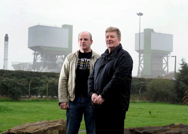 Date:3rd April 2014, Pictured James Hardisty, (JH100319a). Kellingley Colliery, near Knottingley, which could close within 18 months, with the loss of around 700 jobs. Pictured (left to right) Keith Poulson, (Branch Secretary of the NUM Kellingley) with Keith Hartshorne, (Branch NUM delegate at Kellingley and Vice Chair of Yorkshire Area) outside the Colliery.