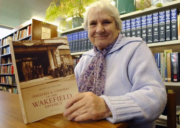 Kate Taylor with her book, Theatres and Cinemas of the Wakefield District.