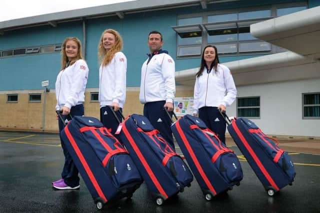 Date:14th June 2015.Picture James Hardisty, (JH1008/91c) Swimmers from City Of Leeds Swimming Club are heading for the European Games in Baku, Azerbaijan. Pictured (left to right) Layla Black, Georgia Coates, coach Rich Denigan, and Amelia Clynes setting of from John Charles Centre For Sport, Middleton Grove, Leeds.