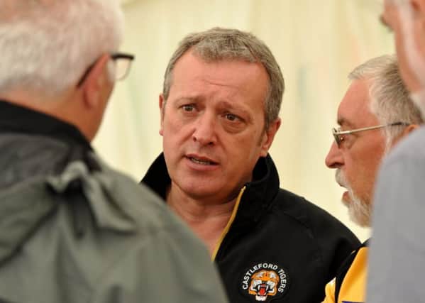 Castleford Tigers chief executive Steve Gill mixes with fans.
