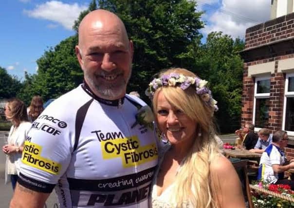 Andy and Elaine Cooper have a cycling-themed wedding