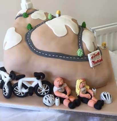 Andy and Elaine Cooper have a cycling-themed wedding. Cycling cake.