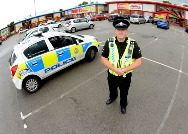Newspaper: Pontefract & Castleford Express.
Story: Boy racers are causing a nuisance in Pontefract and South Elmsall by using retail parks as meeting places and race tracks.
Pictured: Inspector Geoff Carter at the South Baileygate retail site (Pontefract) which is one of the locations that the police will be targeting.
Photo date: 28/07/15
Picture Ref: AB155a0715
