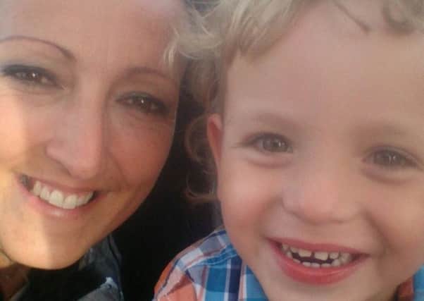 Oliver Roberts pictured with his mum Clair Robinson