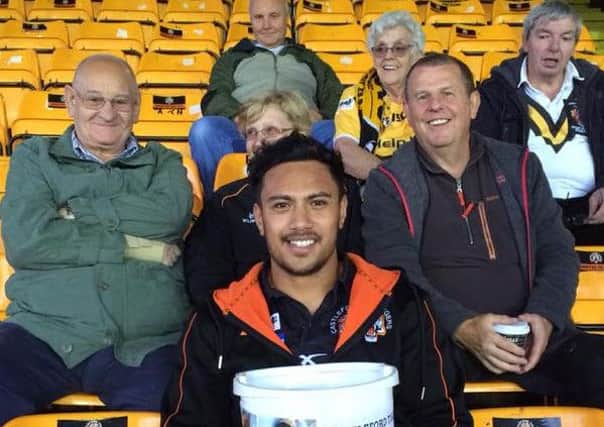 Denny Solomona with fans raising money for two charities which have helped Castleford Tigers star Lee Jewitt and his wife Rebecca as their premature twin baby sons continue to fight for life in hospital.