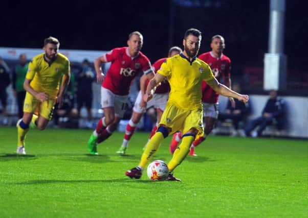 Mirco Antenucci takes the penalty from which he put Leeds United into the lead at Bristol City. Picture: Tony Johnson