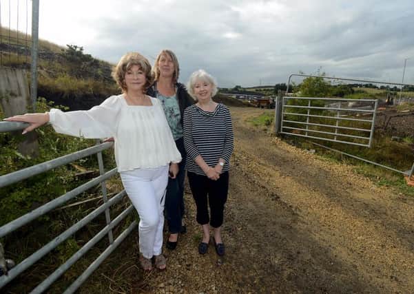 Newspaper: Pontefract & Castleford Express.
Story: Plans for a new development off Flass Lane, Glasshoughton, which include 560 homes, is expected to be approved by Wakefield council.
L to R) Cllrs Denise Jeffrey, Kathryn Scott and Jacquie Speight.
Photo date: 26/08/15
Picture Ref: AB190b0815