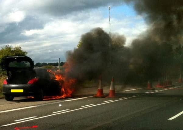 Car fire on the M1 motorway near junction 40. Picture courtesy of Martin Ward.