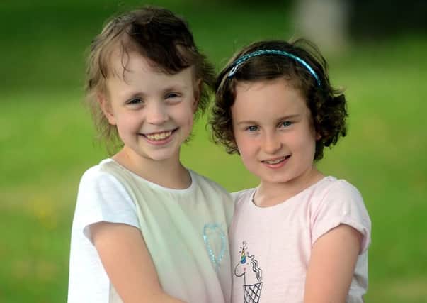 Ella Rigg (L) and her friend Lily Hardy