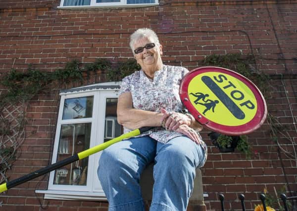 Picture by Allan McKenzie/YWNG - 25/08/15 - Press - Margaret Baggley Lollipop Lady Retirement - Moorethorpe, South Elmsall, England - Margaret Baggley retires after 40 years of lollipop lady duties.