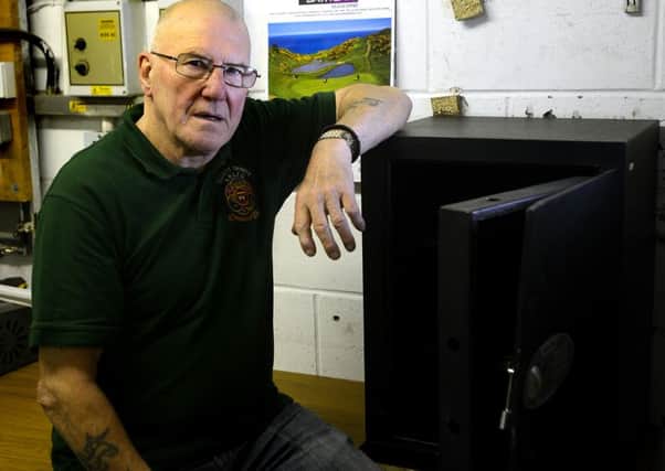 Newspaper: Wakefield Express.
Story: Robbers broke into the safe room at Ossett Trinity ARLFC and forced open the safe which contained £2,800. The thieves then went on to steal rugby kits, trophies and finally smashing up the office.
Mick Sykes - former player and coach, now the club's fundraiser, is pictured with the safe that was forced open.
Photo date: 03/09/15
Picture Ref: AB199b0915