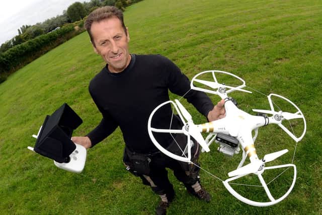 Newspaper: Wakefield Express // Morley Observer.
Story: Brian Wheelhouse, who runs the Whitehall Dog Rescue centre, East Ardsley, uses a drone to help exercise some of the dogs at the centre.
Photo date: 07/09/15
Picture Ref: AB201a0915