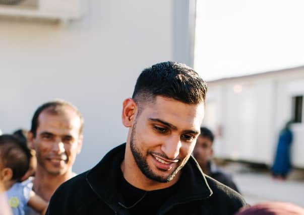 Amir Khan in Greece during an aid mission
Picture: Oliver Hani Ali.
