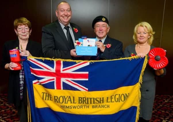 The Hemsworth branch of the Royal British Legion launches it's poppy appeal. Jean Price (chairman)/ Tony Upson (Chair of Hemsworth town council)/ Les Wheater (president)/ Sue Kemp (Organisor). (H553A344)