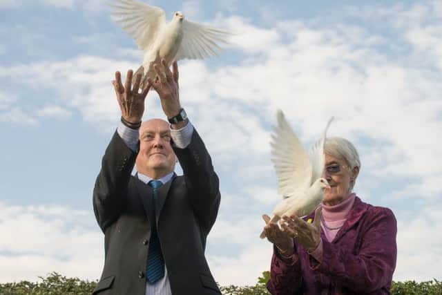 Picture by Allan McKenzie/YWNG - 09/10/2015 - Press - Elsie Frost Memorial Tribute - St George's Church, Lupset, Wakefield, England - Elsie Frost's brother & sister, Colin Frost & Anne Cleave, release the doves in memory of Elsie.