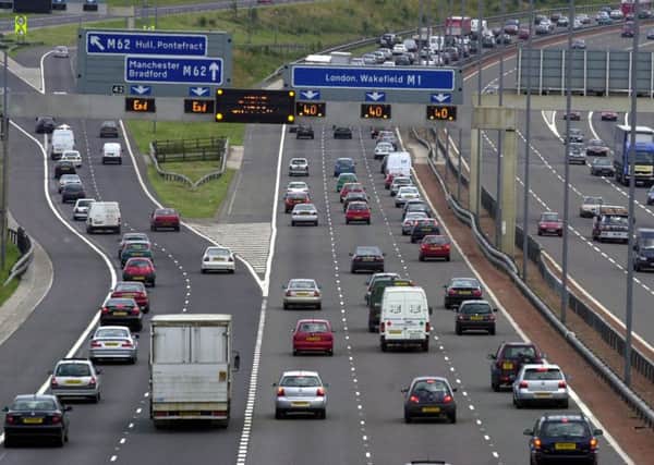 9/7/03     Queueing traffic  on the M1 motorway leaving Leeds in the rush hour last night (wed)