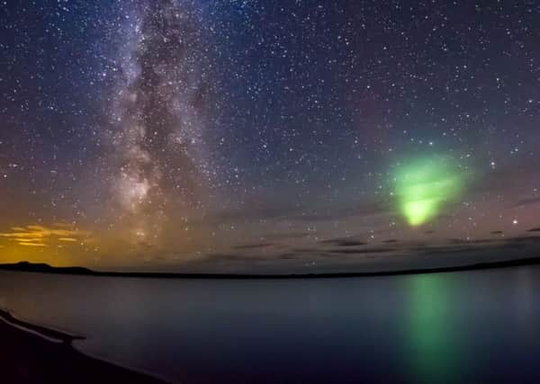 The milky way along with the Aurora shooting in, from the banks of Loch More in Caithness, Scotland. Picture: Ross Parry Agency