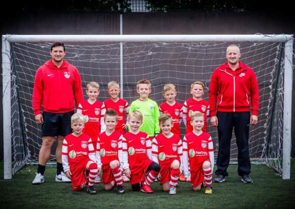 Pontefract Sports and Social under-8s who are hoping to play at Barcelona FC's Nou Camp stadium next year.
