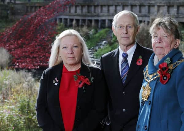 Council leader Peter Box, mayor June Cliffe and armed forces champion Sandra Pickin at the wave of poppies at the Yorkshire Sculpture Park for the launch of this year's Poppy Appeal.