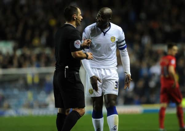 Leeds United's Sol  Bamba argues with referee Tim Robinson. Picture : Jonathan Gawthorpe