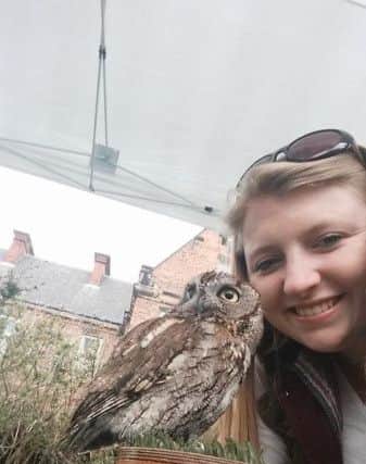 Delilah - missing owl. Pictured with owner Kira Weston.