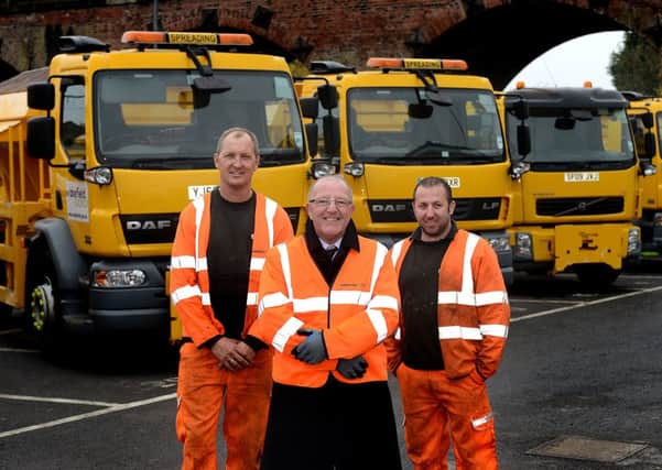 Wakefield council get ready for winter with a fleet of new grit spreaders.
Councillor David Dagger pictured with two of the gritting team.
