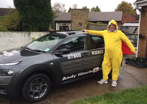 Andrew Hinchcliff dressed up in onesies for Children in Need.