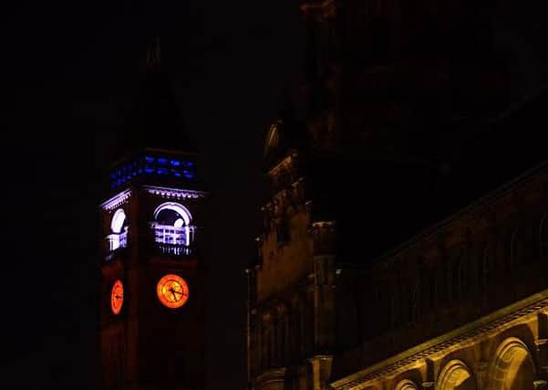 Wakefield Town Hall clock tower lit up in red,white and blue after the Paris terrorist attacks.