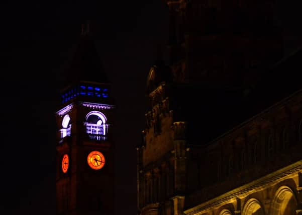 16 Nov 2015...Wakefield Town Hall clock tower lit up in red,white and blue after the Paris terrorist attacks. Picture Scott Merrylees