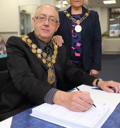 Mayor and Mayoress of Kirkless Paul Knae and Susan Bedford, book of condolence for Paris massacre opened at Dewsbury Town hall