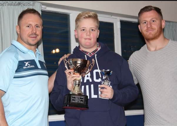 Award winner Lewis Arter with Tim Spears (left) and Larne Patrick. PICTURE: JAMES TODD.