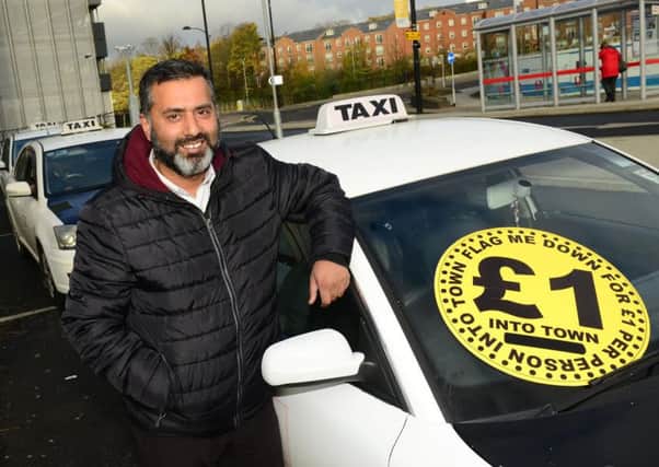 Taxi driver Asif Khan launches the Hackney carriage 'Taxi back to Town for £1' scheme.