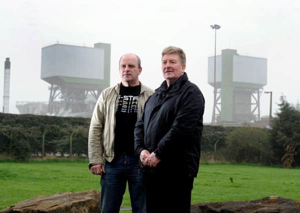 Keith Poulson and Keith Hartshone from the NUM outside Kellingley Colliery, which will close next week