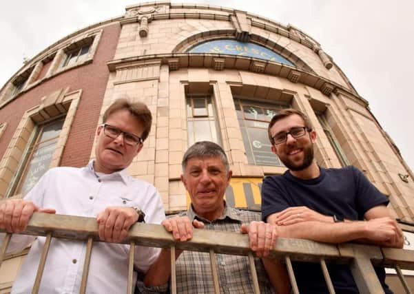Jonathan Griffiths, John Tollick and Karl Gilbert from The Crescent group outside the former cinema.