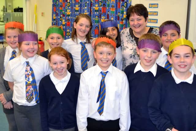 Hendal headteacher Christine Platts with her young helpers
