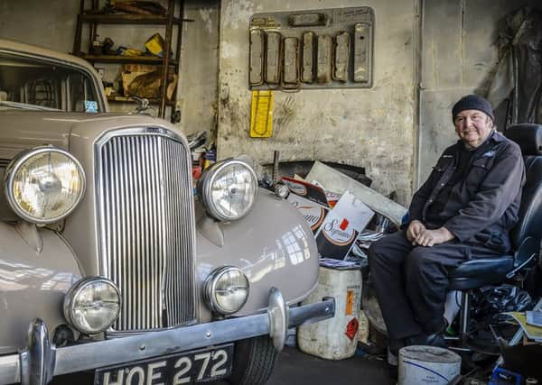 John Foy in his garage. Picture Nigel Hazell