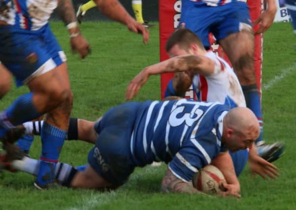 Featherstone's John Davies scores the opening try in Sunday's match against Wakefield. Picture: Carol Austerberry.
