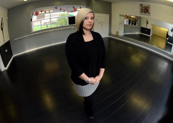 Newspaper: Wakefield Express.
Story: Samantha's School of Dance based at Standbridge Community Centre, Wakefield, has been broken into twice over one weekend.
Pictured: Business owner Samantha Williams in her dance studio.
Photo date: 13/01/16
Picture Ref: AB011a0116