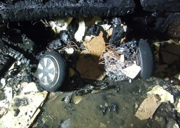 A hoverboard that was on charge caught fire and caused significant damage.