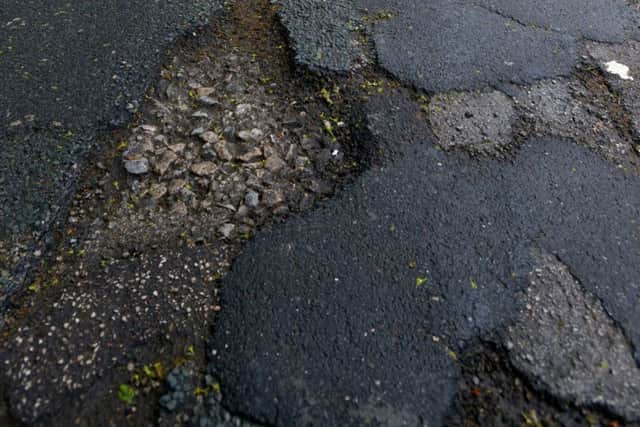 Potholes on North Avenue, Wakefield.