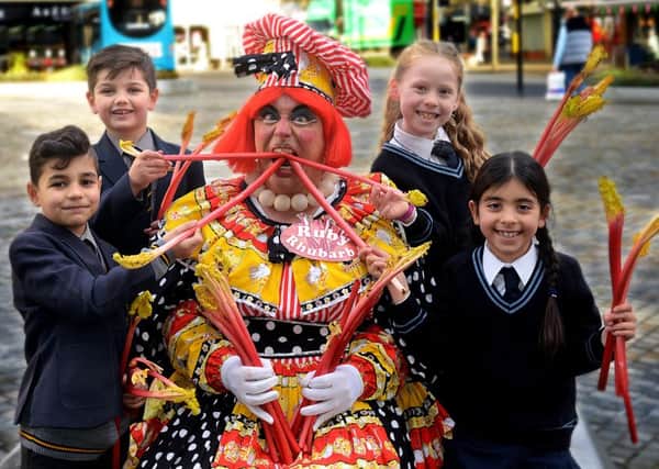Newspaper: Express series.
Story: Official launch of the 10th annual food, drink & rhubarb festival in Wakefield.
Ruby Rhubarb with Wakefield Girls School & QEGS (Juniors) pupils (L to R) Ehteshaam Ahmed, Ewan Walsh,  Abbi Riddiogh and Arianna Pascale.
Photo date: 25/01/16
Picture Ref: AB028c0116