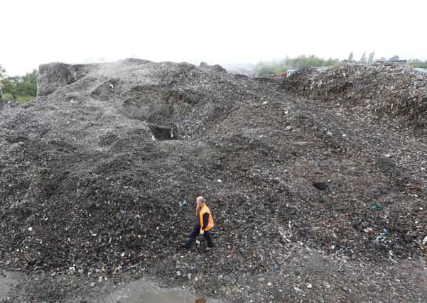 Graham Brocklesby, the 53 year old managing director of BBPL, surveys the ten thousand ton pile of rubbish on his property in Great Heck, Yorkshire.