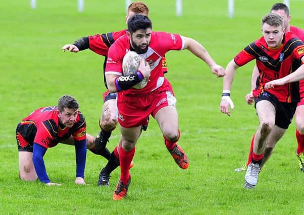 Fryston full-back Ryan Meah bursts clear in Saturday's game against Upton . Picture: Matthew Merrick.