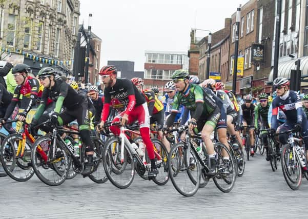 Cyclists race through Wakefield city centre in the Tour de Yorkshire last year.