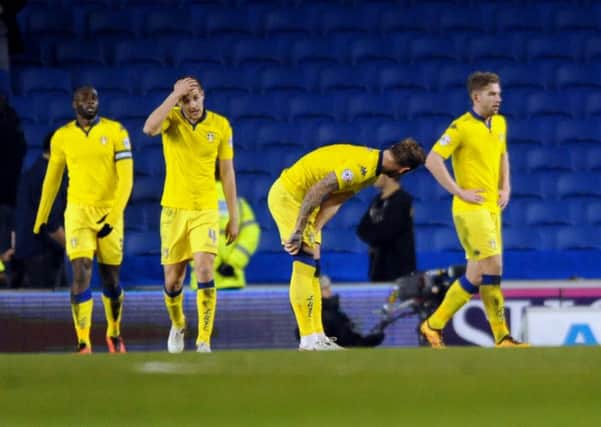 Dejected Leeds United players after Brighton score their fourth goal. Picture: Simon Hulme