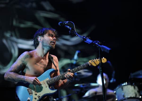 Biffy Clyro on stage at the Leeds Festival.