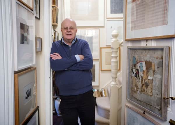 London-based art collector Tim Sayer, with some of his collection.